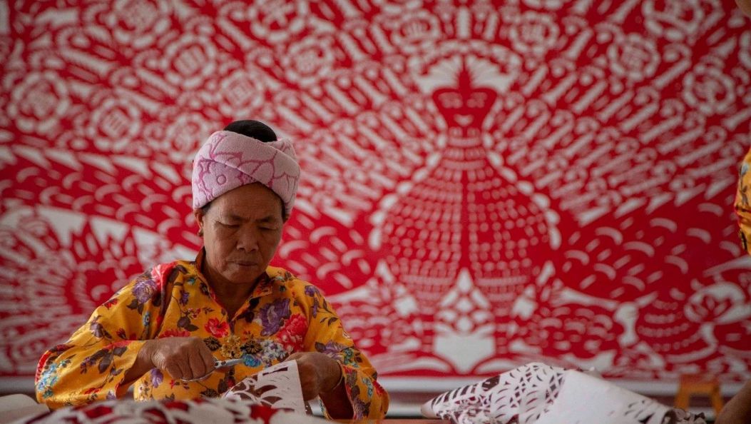 传承千年的傣族剪纸——  一剪一世界　 一刀一乾坤