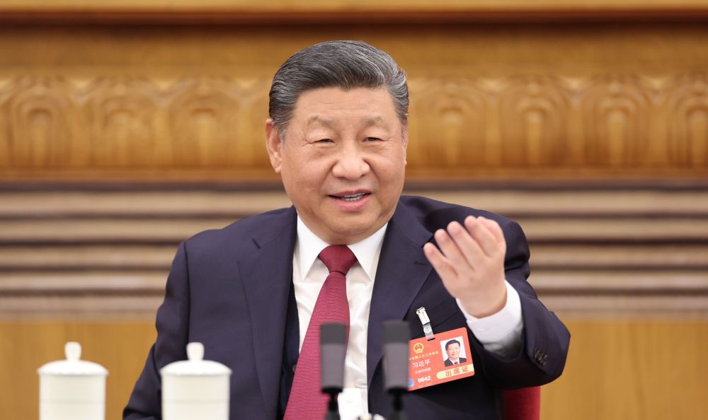 微镜头·习近平总书记两会“下团组” | “始终保持弄潮儿的角色”